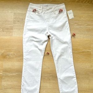 White skinny jeans , high rise.